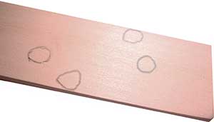 Trace marks on a pinewood derby block