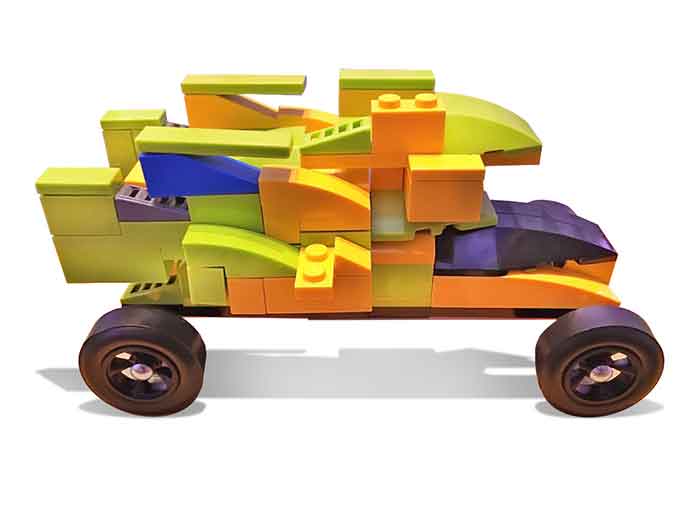 A LEGO pinewood derby  car doesn't need to look like a car.